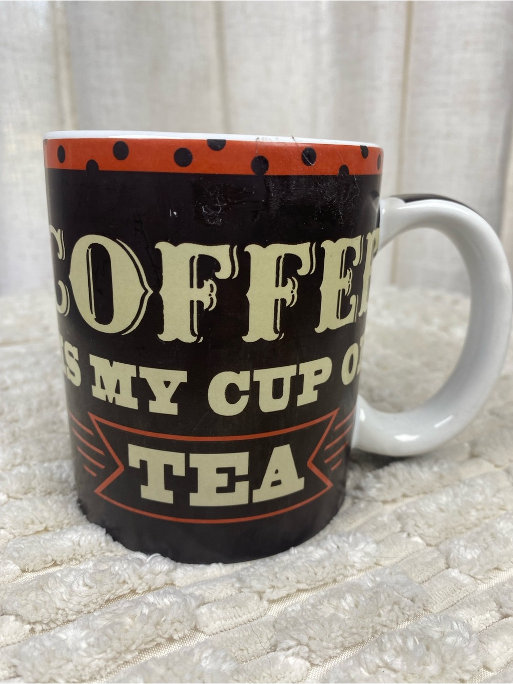 Certified International Black Mug with Orange Trim and Cream Lettering